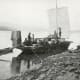 Klondikers sailing toward Dawson on the upper Yukon River, 1898.