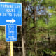 Sign near the parking lot of the 100 Acre Wood Preserve