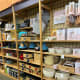 Assorted kitchen ware and tools from pots, pans, mixing bowls, spatulas, and more
