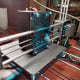 View of extruder and the rails that guide it across the platform