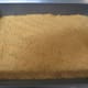 Spread the graham cracker mixture evenly in bottom of a baking pan