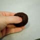 Using your thumb, press an indentation into the center of the cookie.