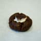 Place the peppermint patty piece into the hole.