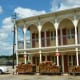 Notice all that stacked mesquite wood outside the building?