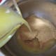 Pour the melted butter into the graham cracker crumbs