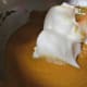 Fold the egg whites into the custard mixture
