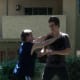 Defender steps back with his left foot and turns his body, releasing pressure from his windpipe
