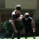 In the alternate version, the defender traps the attacker's arm under his arm