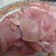 A plate of flattened chicken thighs