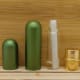 Inhaler stick showing the wick inserted into the glass vial where it is drinking in essential oils previously added.