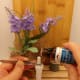 Adding essential oil drops to the inhaler wick.