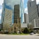 Church with the tall buildings as a backdrop in downtown Houston, Texas