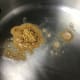 Heat the oil and add in the cumin. Cook for only a few seconds.