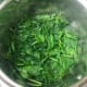 Steam the spinach in 1 cup of water and puree it while the sauce is simmering.