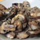 Cooked mushrooms and shallots removed to a dish