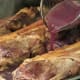 Add the balance of the red wine and chicken broth.