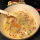 Note: I make chicken broth every time my wife and I cook a whole chicken. I freeze the broth in 1/2 cup portions (reusable KFC mashed potato containers) and then use it in recipes such as this one...thus the round ice thingies in my broth here.