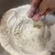 Make a well in the center of the dry ingredients.