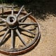 Old wagon wheel adorning the grounds