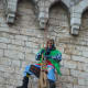 An Italian firefighter dressed as La Befana in Gubbio.