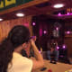 Our daughter Noelle at the coin-op shooting gallery.