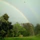 A double rainbow over the pasture