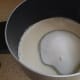 Add sugar to evaporated milk.