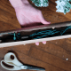 Gather tje plug and hanging cord. Secure it with a twist tie and place it in a cardboard tube.