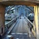 Lower level of Ponte de Dom Luis 1, shared by pedestrians and vehicles.