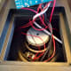 Large 8-inch speakers allow no room to remove and inspect battery