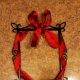 Create a bow with the ends, tying ribbon as you would a shoe lace.