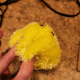 Pinch the two outer corners in together and secure with hot glue.