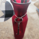 Tie your old key around the front of your vase or container.