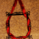 Wrap ribbon around the frame leaving the ends out at the top.