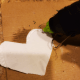 Hot glue around the edge to secure the two heart shapes together, leaving a hole for the stuffing.