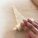 Roll up the croissant gently with your fingers until you reach the top.