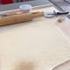 Take the chilled dough from the fridge and turn it out on a baking mat or floured surface.