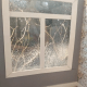 Acetate window with sprayed-on snow.