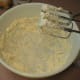 Soften the butter in a medium mixing bowl then blend with a mixer until creamy.