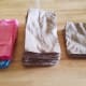 Polyester sheet cut into pieces for making cloth toilet paper. I made the blue and pink fabric into tissues.