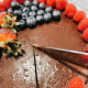 To get a clean cut, slice the chocolate tart with a warm knife.