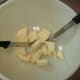 Cut the butter into smaller pieces to speed up the softening process.