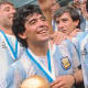 Diego Maradona celebrating the world cup win with Argentina.