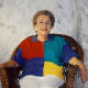 My mother relaxing in a lobby chair