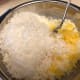 Adding in the pineapple, coconut, and eggs