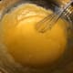 Butter, sugars, flour, and eggs whisked together