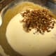 Add milk and pecans