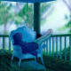 Capture the delight of getting cozy during a rainstorm. If you have no real rainstorm, search online music selections for a rain-background video you enjoy.