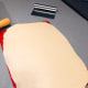 Using a rolling pin, roll out each dough ball into a 16-inch-long rectangle.