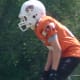 My youngest son as running back for his rep team waiting for the ball.